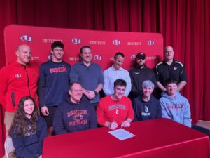 Nine University athletes sign to continue athletic, academic careers at collegiate level